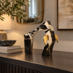Black and Gold Stone Arch Sculpture with Gold-Tone Accent