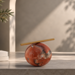 Red Agate Sphere Sculpture with Gold-Tone Bar