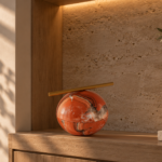 Red Agate Sphere Sculpture with Gold-Tone Bar
