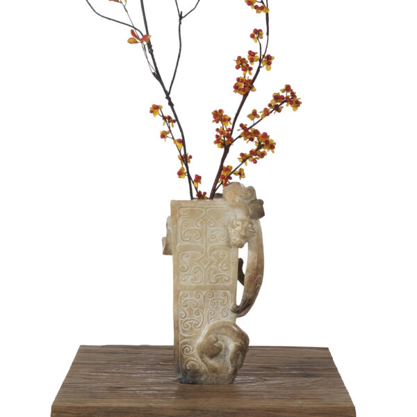 Weathered Stone Vase with Animal-Head Handle