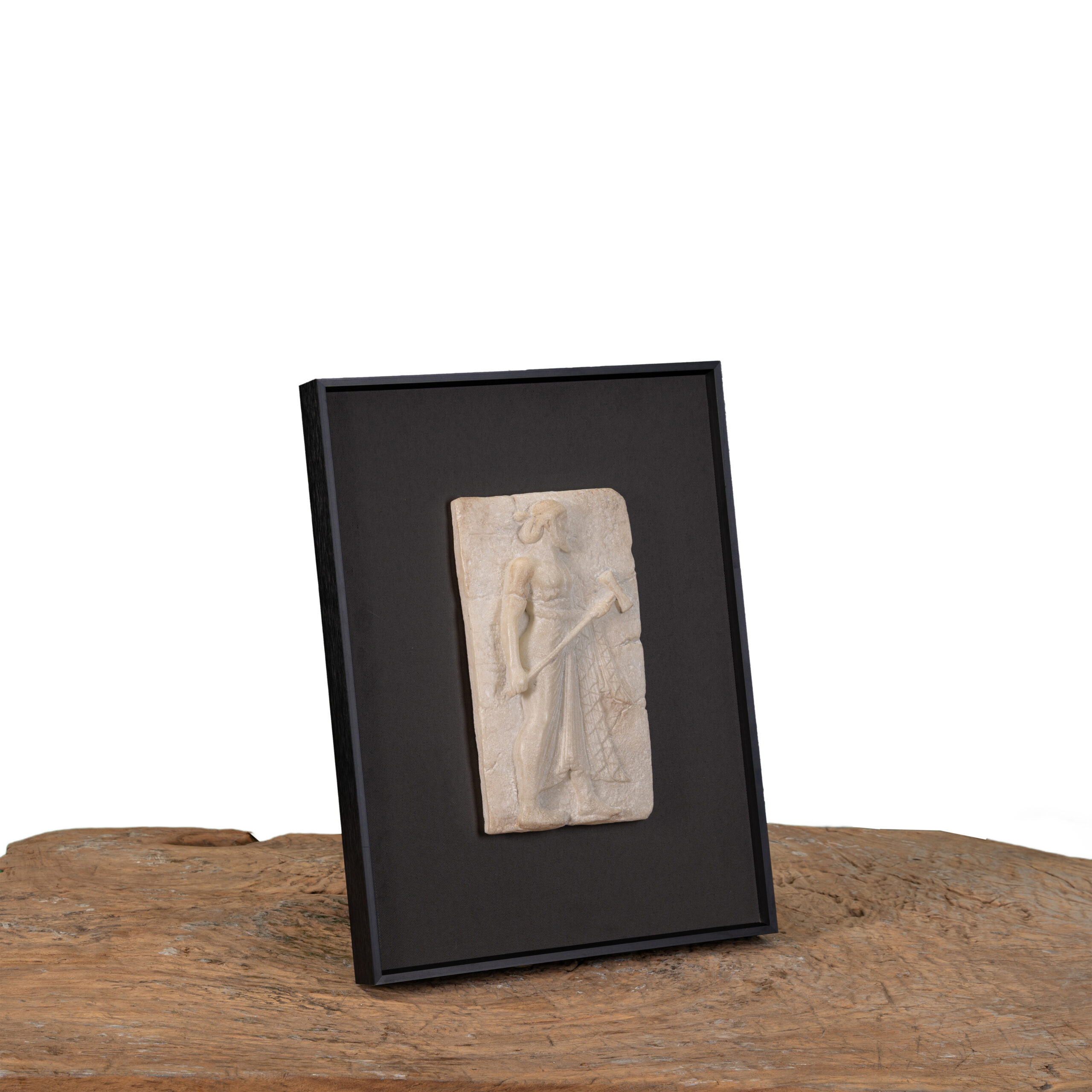 Framed classical figure relief wall art hung at eye level